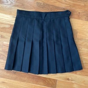 Black American Apparel pleated tennis skirt. Never worn. Super cute.
